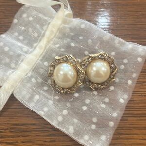 Post pierced pearl earrings